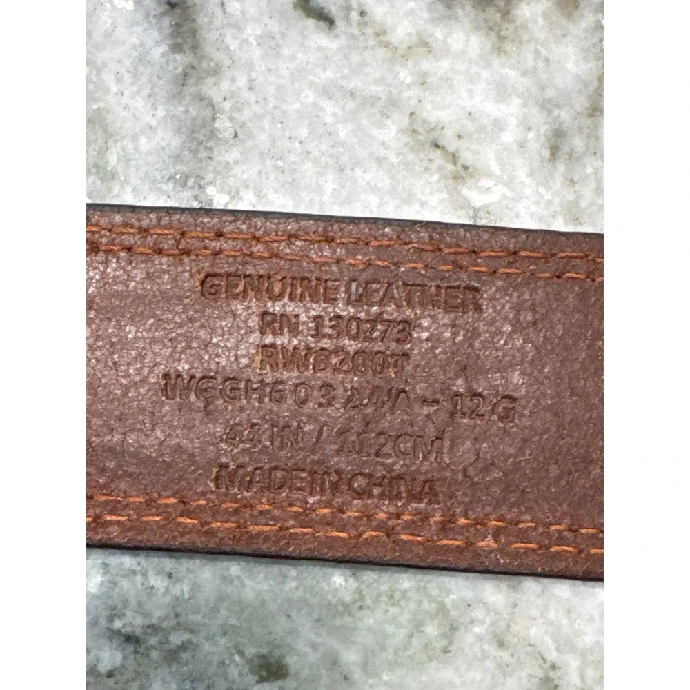 Men's brown‎ leather belt featuring a prominent woven-inlay pattern size 44
